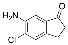 6-amino-5-chloro-2,3-dihydro-1H-inden-1-one