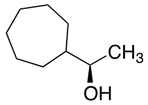 (1R)-1-Cycloheptylethan-1-ol